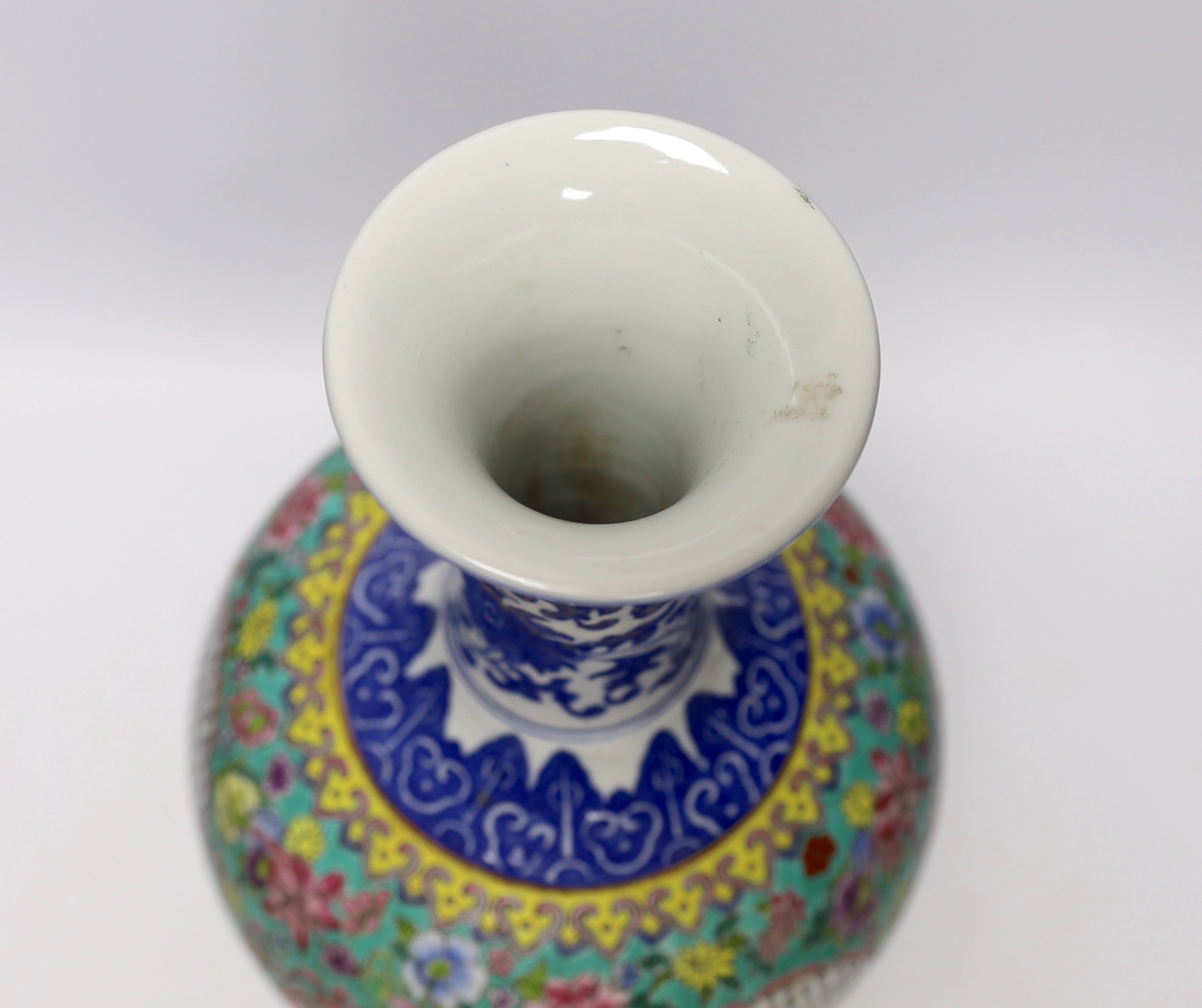 A Chinese famille rose vase, decorated with peaches and flowers, 35cm high